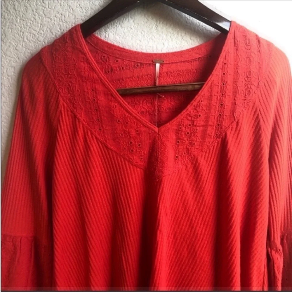 Free People orange flare sleeve blouse
